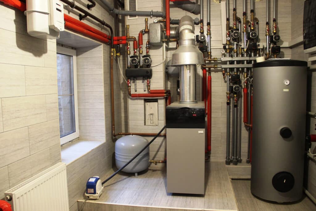 House boiler, water heater, expansion tank and other pipes. newmodern independent heating system in boiler room, gas